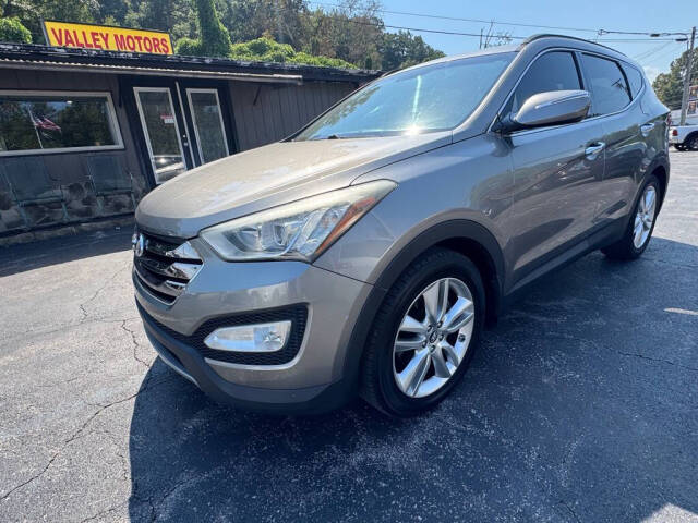 hyundai santa fe 2013 5XYZU3LA7DG077112 image hyundai santa fe 2013 5XYZU3LA7DG077112 image